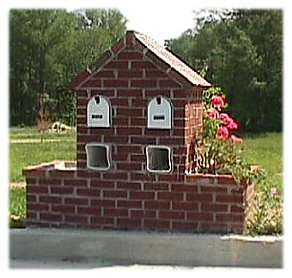 Brick mailbox with flower box