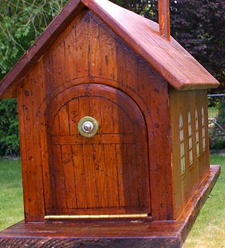 Wooden birdhouse mailbox